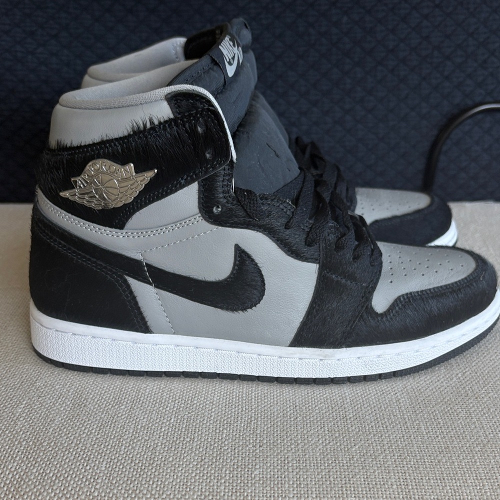Never worn Nike W9 Air Jordan Retro Pony Hair Hi-Top Sneakers